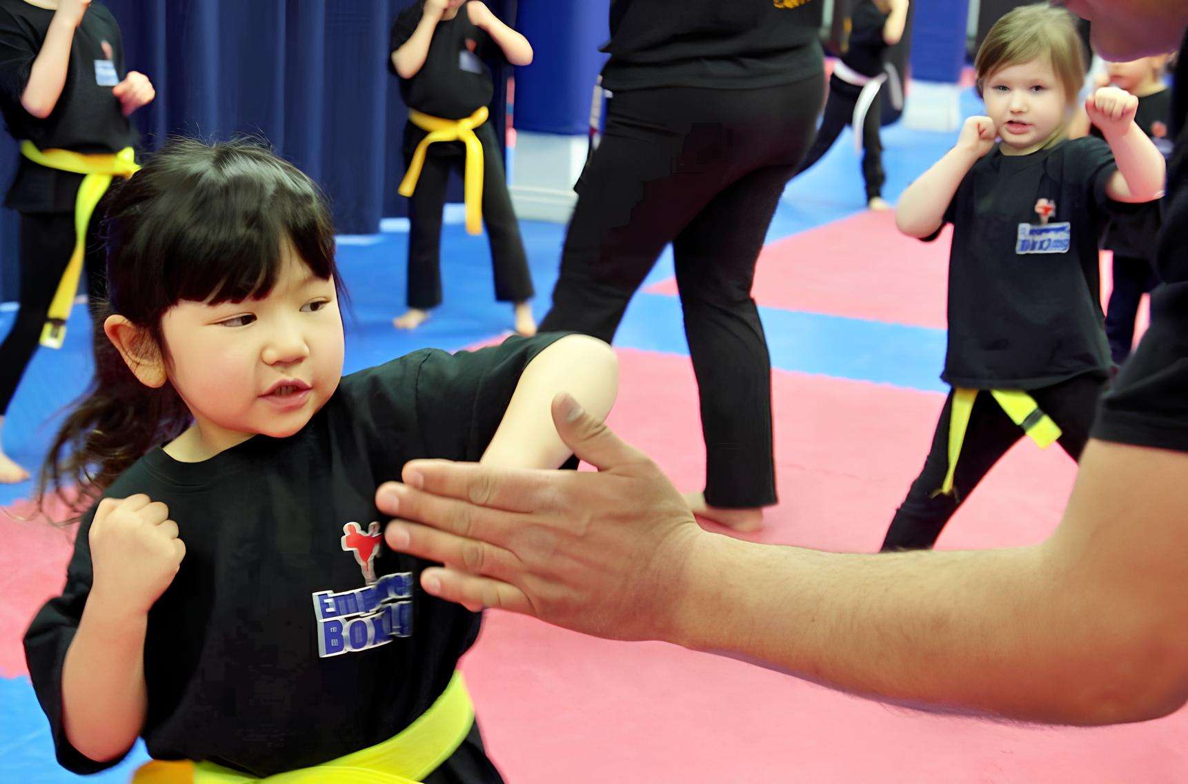 kid hook punch Empower Kickboxing -2 Orlando Martial Arts Camp kickboxing practice