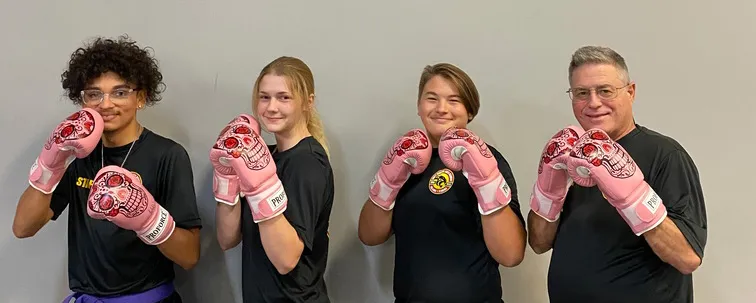 About Unity Martial Arts Orlando martial arts instructors pose at Orlando Martial Arts School